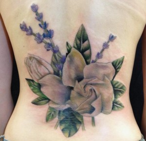 Gardenia and Lavender coverup on the lower back. This piece inspired my drawing on the Art page titled, "Botanically Spaced."