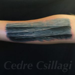 ocean surfers waves color tattoo